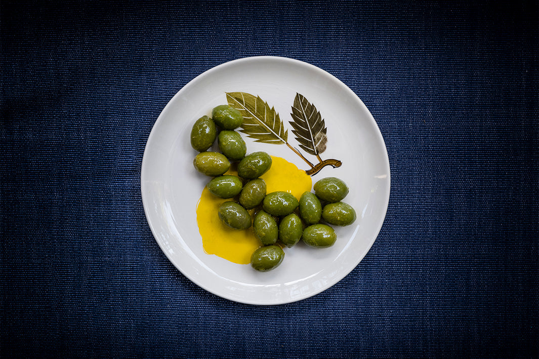 Olive da mensa con buccia di limone - Tafeloliven mit Zitronenzeste und Olivenöl